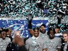 Jalen Hurts and his Eagles teammates celebrate their NFC Championship win.