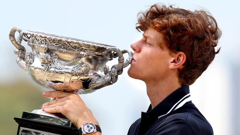 MELBOURNE, AUSTRALIA - JANUARY 27: Jannik Sinner of Italy poses with the Norman Brookes Challenge Cup during the 2025 Australian Open Men's champion media opportunity at Albert Park Lake on January 27, 2025 in Melbourne, Australia. Sinner defeated Alexander Zverev of Germany in last night's Men's Singles Final. (Photo by Kelly Defina/Getty Images)