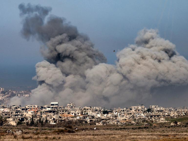 BREN CARLILL: Gaza’s next chapter depends on whether the international community is willing to act decisively. If not, this ceasefire could be remembered as a brief pause before the next war. Pictured: Explosions above destroyed buildings in the northern Gaza Strip on January 13, 2025.