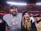 Taylor Swift celebrates with Travis Kelce.