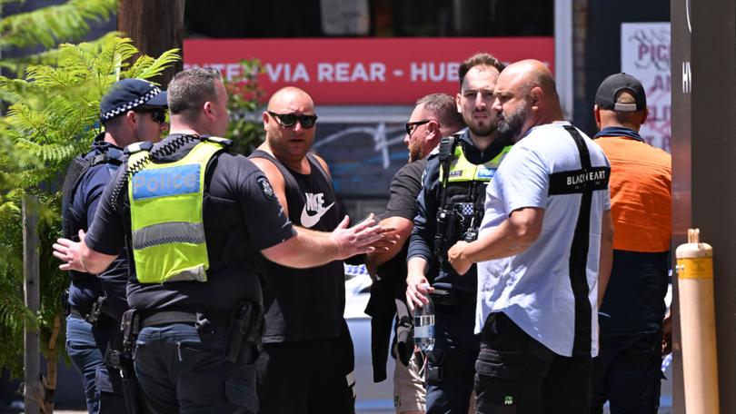 Police and members of the public at the scene of high-profile gangland figure Sam "The Punisher" Abdulrahim’s fatal shooting.