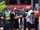 Police and members of the public at the scene of high-profile gangland figure Sam "The Punisher" Abdulrahim’s fatal shooting.