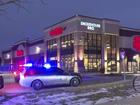 Police attend the scene of a deadly shooting at a grocery store in Elkhart, Indiana. (AP PHOTO)