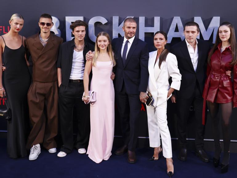 David Beckam with Mia Regan, Romeo Beckham, Cruz Beckham, Harper Beckham, Victoria Beckham, Brooklyn Beckham, and Nicola Beckham.