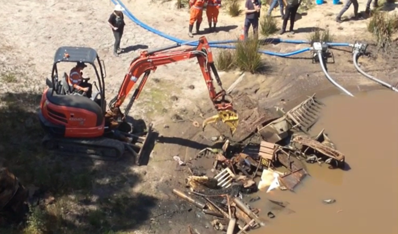 Police searched a farm in Dereel on Wednesday, draining a dam and bringing in an excavator. 