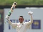 Usman Khawaja of Australia celebrates scoring his double century.