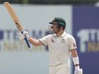 Josh Inglis celebrates after scoring a half-century.