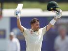 Josh Inglis of Australia celebrates a century.