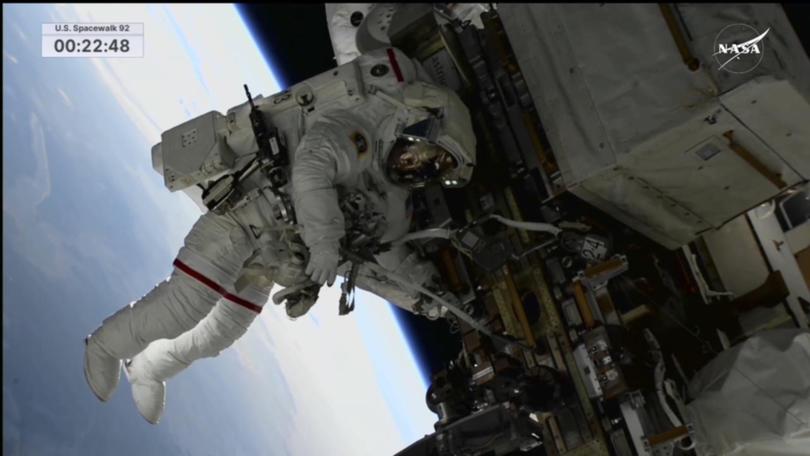 NASA's two stuck astronauts cleaned the outside of the International Space Station. (AP PHOTO)