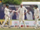 Nathan Lyon celebrates after taking the wicket of Prabath Jayasuriya.