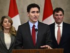 Canadian PM Justin Trudeau addresses the media after US President Donald Trump signed an order to impose stiff tariffs on imports from Mexico, Canada and China, in Ottawa.