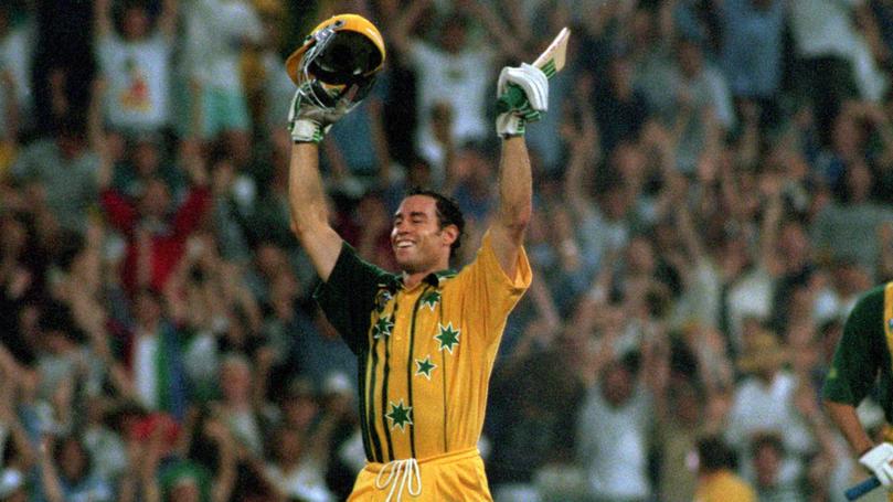 Michael Bevan celebrates after hitting a four off the last ball against the West Indies at the SCG in 1996.