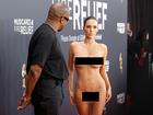 Kanye West was seen issuing instructions to Bianca Censori as she stripped off on the Grammy’s red carpet. 