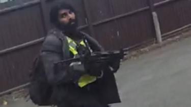 Hari Mann was wearing a high-vis jacket and carrying a fake automatic weapon.