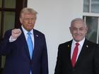 President Donald Trump greets Israeli Prime Minister Benjamin Netanyahu as he arrives at the West Wing of the White House.