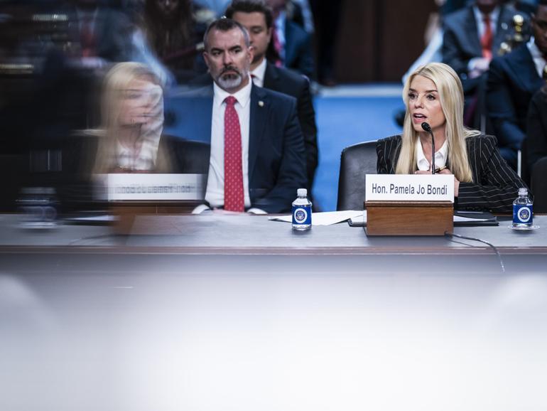 Pam Bondi, President Donald Trump's choice to lead the Justice Department as attorney general, listens during a Senate Judiciary Committee hearing in January. She does not fully acknowledge Joe Biden's victory in 2020.