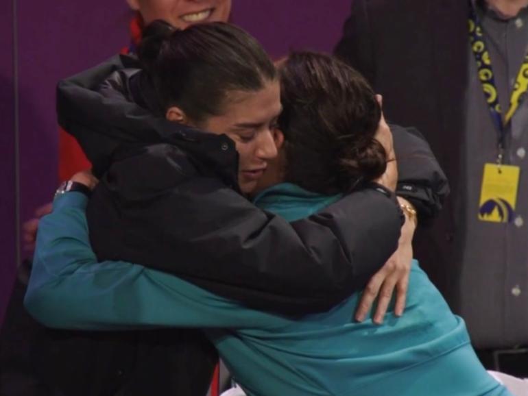 Simona Halep (right) hugs Sorana Cirstea following the retirement announcement.