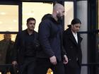 Sam Kerr has left a London court flanked by security with brother Levi and father Roger behind her.