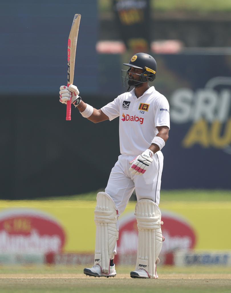 GALLE, SRI LANKA - FEBRUARY 06: Dinesh Chandimal of Sri Lanka celebrates after scoring a half century during day one of the Second Test match in the series between Sri Lanka and Australia at Galle International Stadium on February 06, 2025 in Galle, Sri Lanka. (Photo by Robert Cianflone/Getty Images)