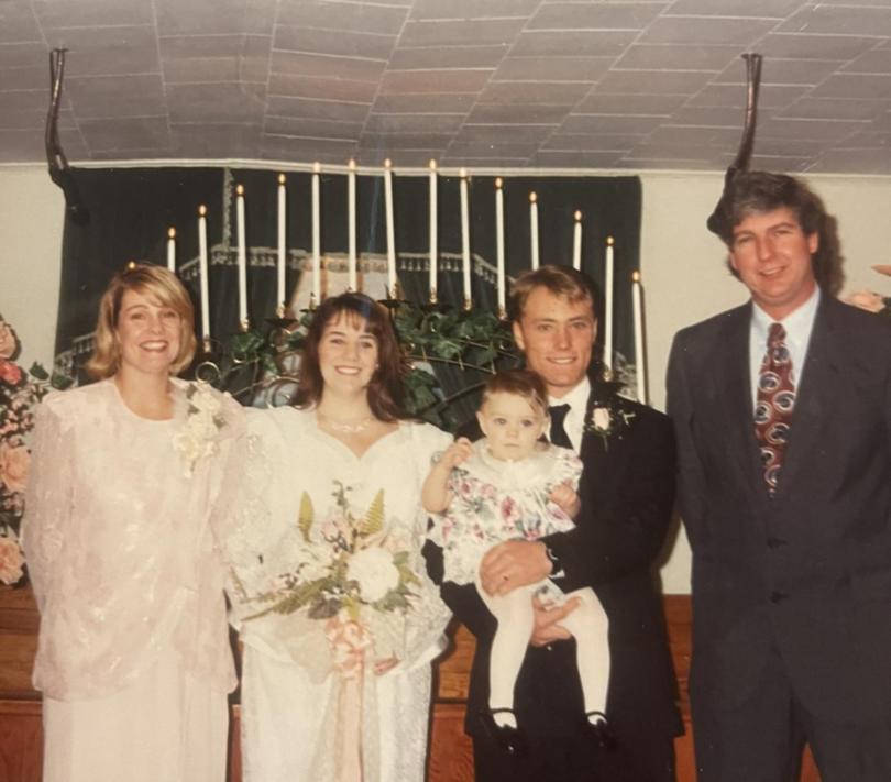 Bill and Beverly Bryan, far ends, at the 1992 wedding of Bill's daughter and son-in-law. 