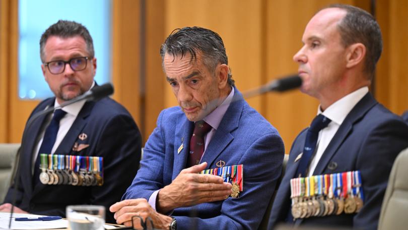 Dan Fortune DSC and Bar speaks during an inquiry into Defence honours and awards system at Parliament House in Canberra, Friday, February 7, 2025. (AAP Image/Lukas Coch) NO ARCHIVING