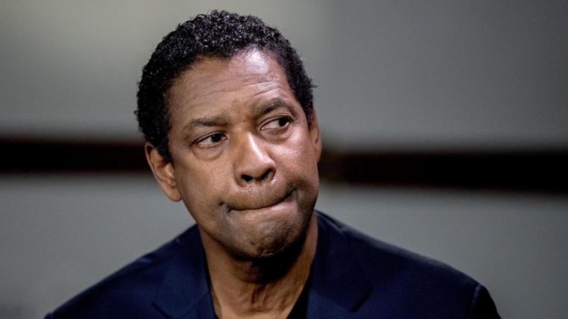 Denzel Washington says he bit his tongue “almost half-off a few months ago”. 