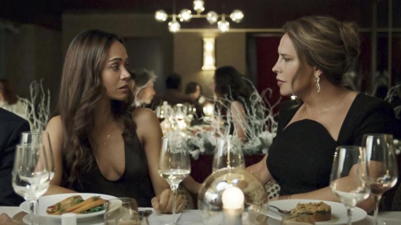 Karla Sofía Gascón, right, with Zoe Saldana in Emilia Perez.