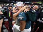 Jalen Hurts embraces fiancee, Bry Burrows after winning the Super Bowl