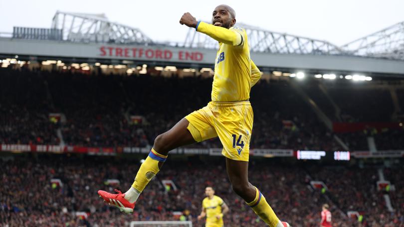 Jean-Philippe Mateta of Crystal Palace celebrates scoring his team's first goal.