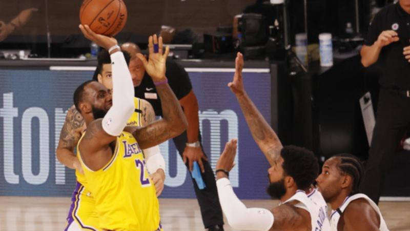 LeBron James made the winning basket to lead the Lakers to victory over the Clippers in the NBA.