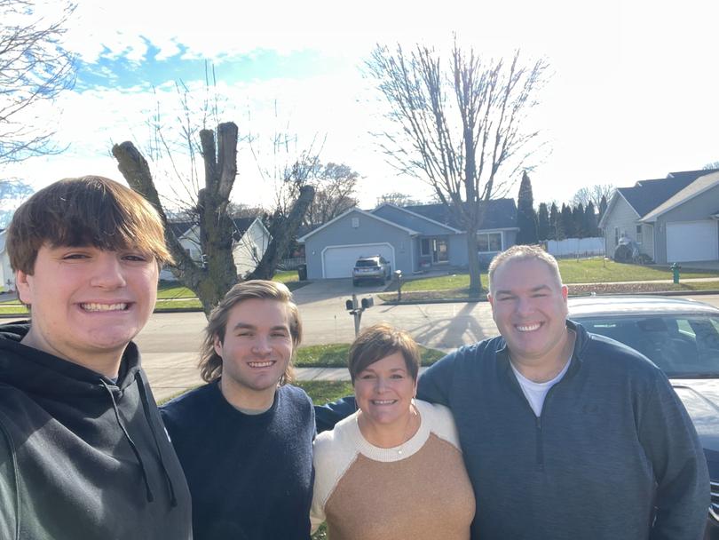 Cole Schmidtknecht, second from left, with his younger brother, Dane, and their parents, Bil and Shanon