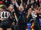 Port Adelaide coach Ken Hinkley (centre) will hand over the reins at the end of the season.  (Matt Turner/AAP PHOTOS)