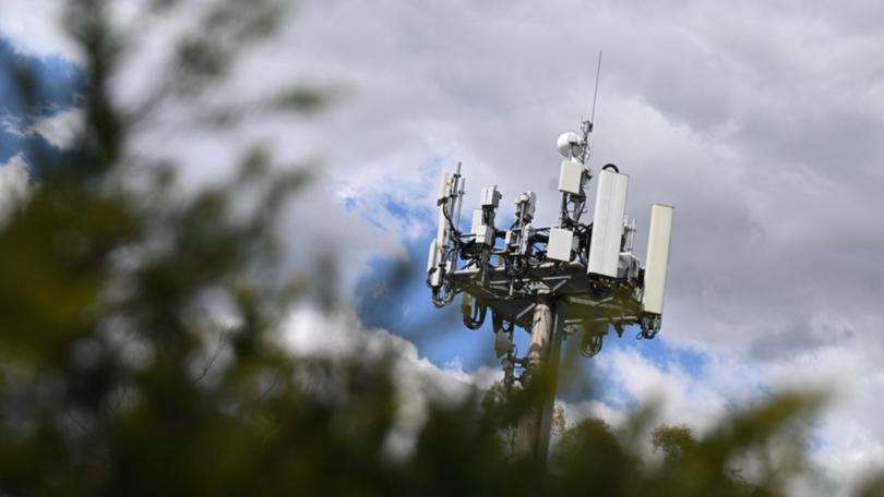 Telstra investigated reports triple zero calls from a rural property failed during a fatal fire.