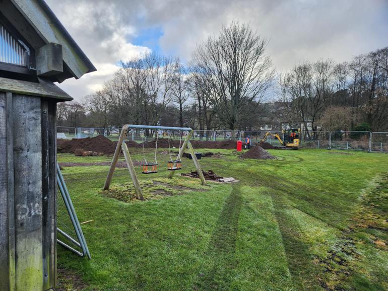 Dozens of World War II-era bombs are excavated from Scotts Park in Wooler, England, on Feb. 7. 