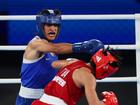 PARIS, FRANCE - AUGUST 06: Imane Khelif hits Thai boxer Janjaem Suwannapheng during the Paris Games.