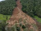 A family were lucky to escape a massive landslide, triggered by heavy rain. (HANDOUT/AARON PIKE)