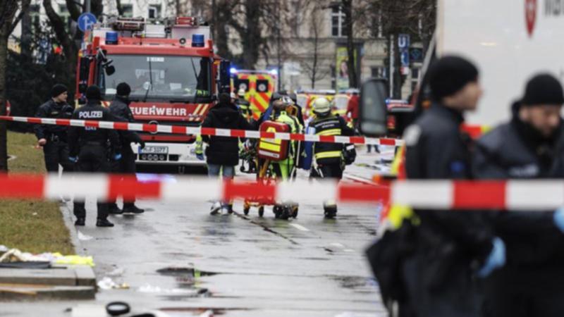 Emergency services attend the scene after a driver hit a group of people in Munich.