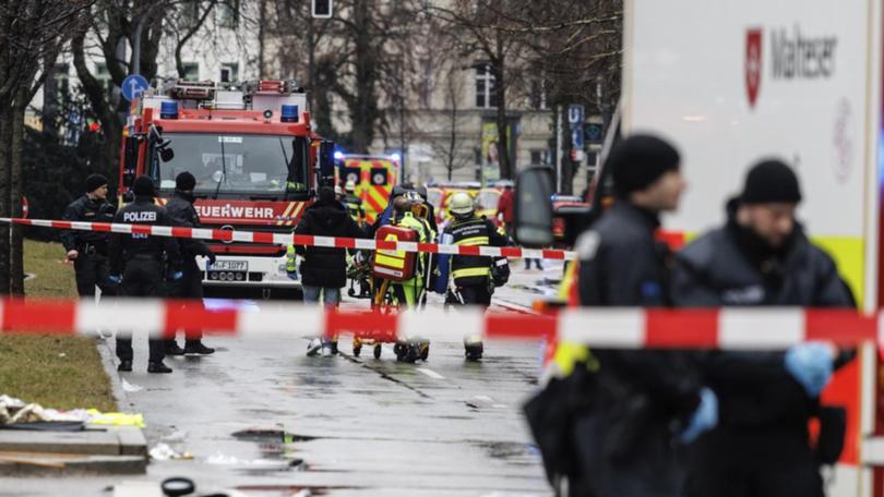 Emergency services attend the scene after a driver hit a group of people in Munich.