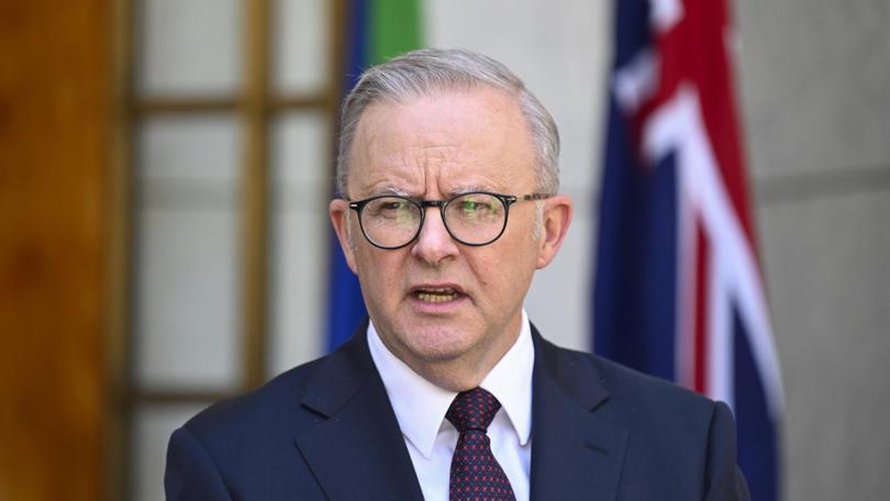 Anthony Albanese has been heckled at a press conference. 