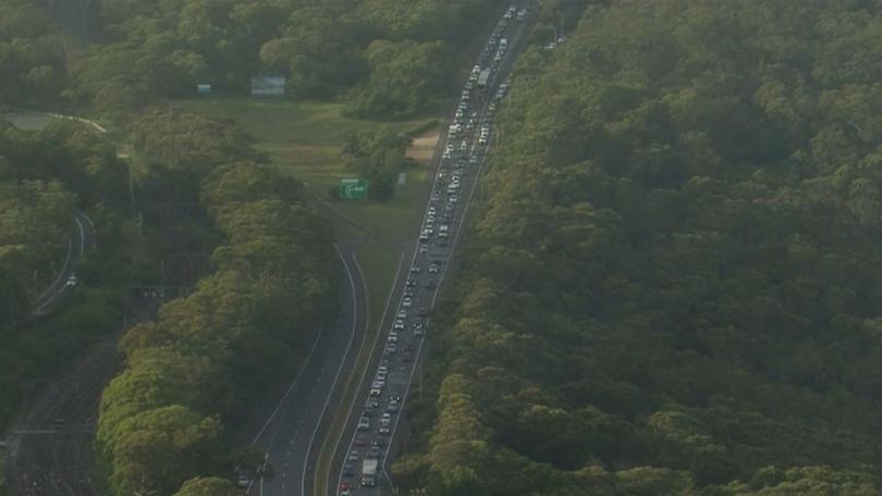 Bumper-to-bumper traffic is snaking away from the crash site, as motorists are diverted.