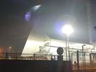 A searchlight illuminates a hole in the roof of the Chernobyl nuclear power plant. (AP PHOTO)