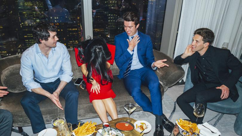 Max Castroparedes, wearing a tie, and guests at a dinner he organized and called a gathering of ÒMAGA Youth,Ó at Centurion New York in Midtown Manhattan, Feb. 12, 2025. Young Trump supporters assembled at the members-only club to celebrate the nascent Republican administration, and assert their fashionableness — and their fealty to the new president. (Sara Konradi/The New York Times)