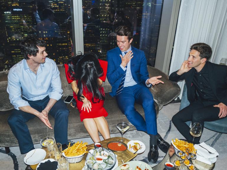 Max Castroparedes, wearing a tie, and guests at a dinner he organized and called a gathering of ÒMAGA Youth,Ó at Centurion New York in Midtown Manhattan, Feb. 12, 2025. Young Trump supporters assembled at the members-only club to celebrate the nascent Republican administration, and assert their fashionableness — and their fealty to the new president. (Sara Konradi/The New York Times)