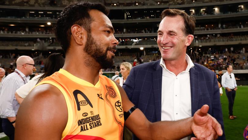 AFL CEO Andrew Dillon and Willie Rioli.