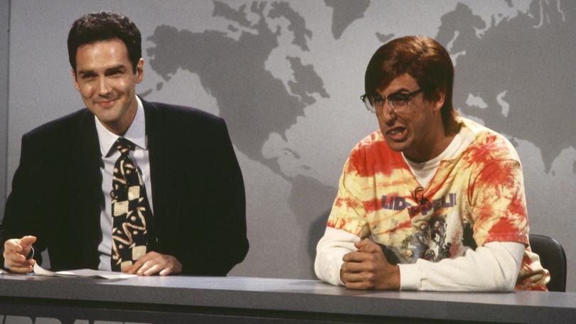 Norm MacDonald and  Adam Sandler on set in 1994.