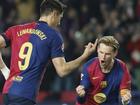 Robert Lewandowski celebrates after scoring the only goal as Barcelona beat Rayo Vallecano. (AP PHOTO)