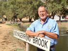 Tony Maddox was charged by the Department of Planning, Lands and Heritage after concreting his gravel crossing.