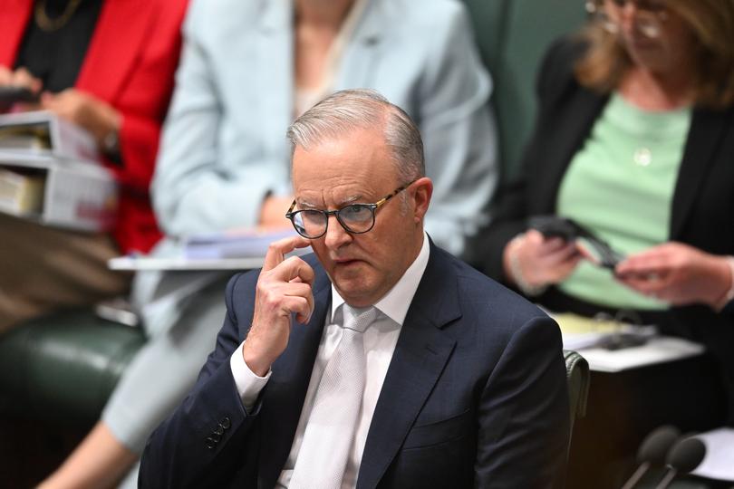 Australian Prime Minister Anthony Albanese reacts during House of Representatives Question Time.