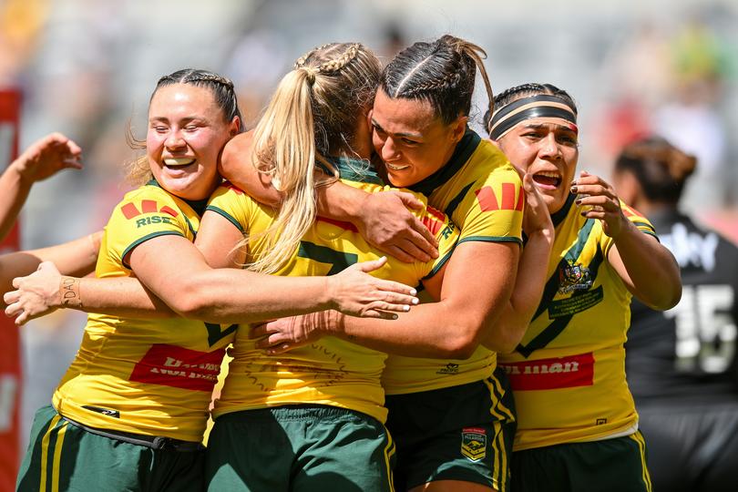 Tarryn Aiken celebrates with teammates after scoring a try during the 2024 Pacific Championships Pacific Cup Women's Final match between Australia Jillaroos and New Zealand Kiwi Ferns last year.