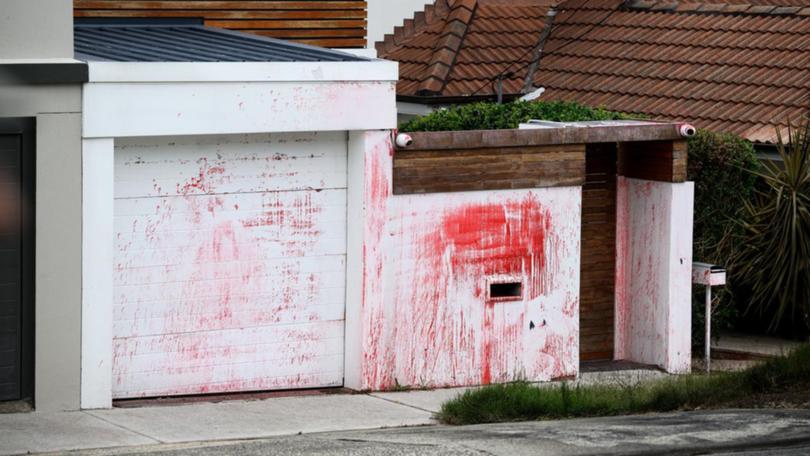 A man will face court after red paint was thrown at the former home of a Jewish community leader. (Bianca De Marchi/AAP PHOTOS)